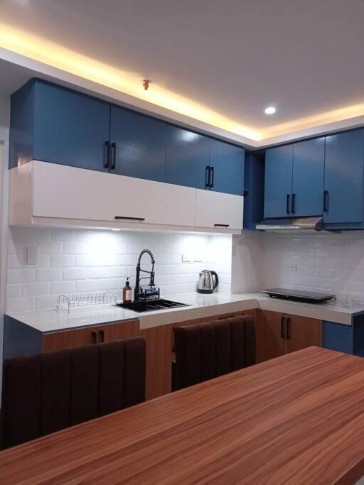 Balai ni Boss - Cozy Modern 1BR in Victoria Sports Tower view 4