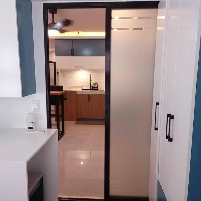 Balai ni Boss - Cozy Modern 1BR in Victoria Sports Tower view 5