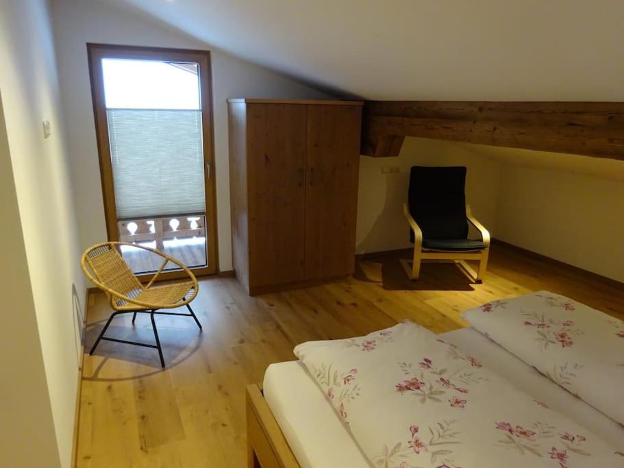 Gemütliche Dachgeschosswohnung mit Balkon & Garten