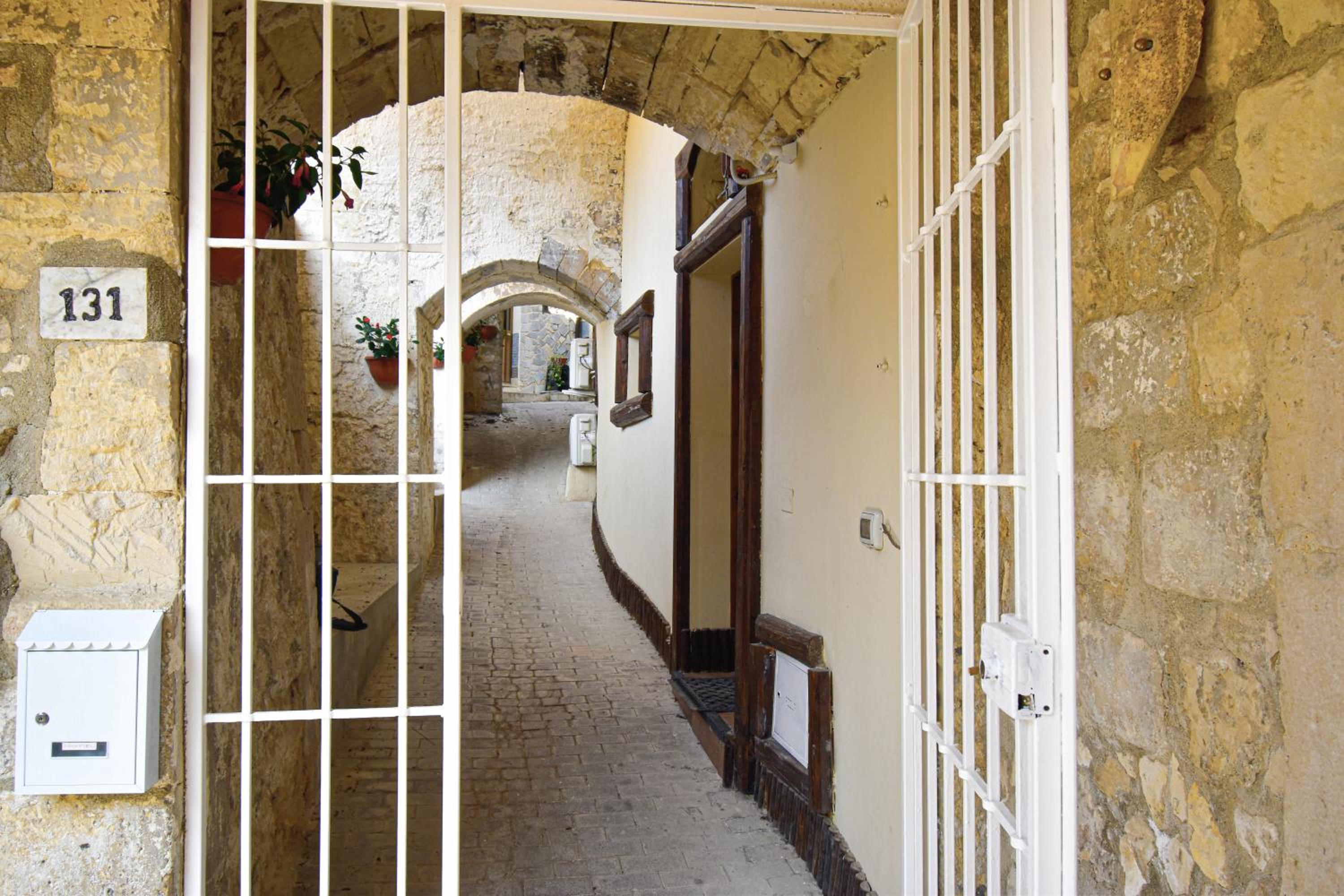 Hotel Domum in petra casa nella roccia Self check - in - Image 1