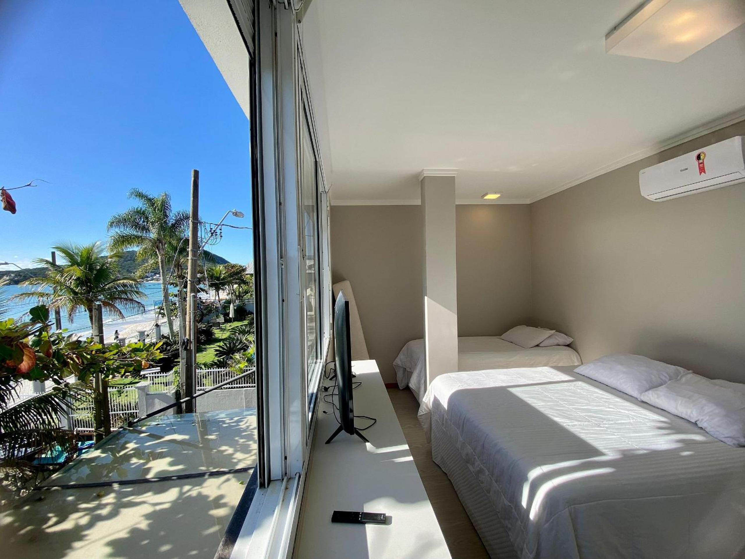 415 - Casa frente mar para alugar Bombinhas com 4 suítes