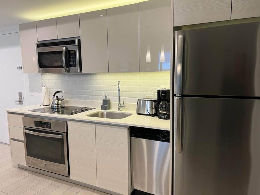 Cozy Beach Apartment with Full Kitchen -A view 5