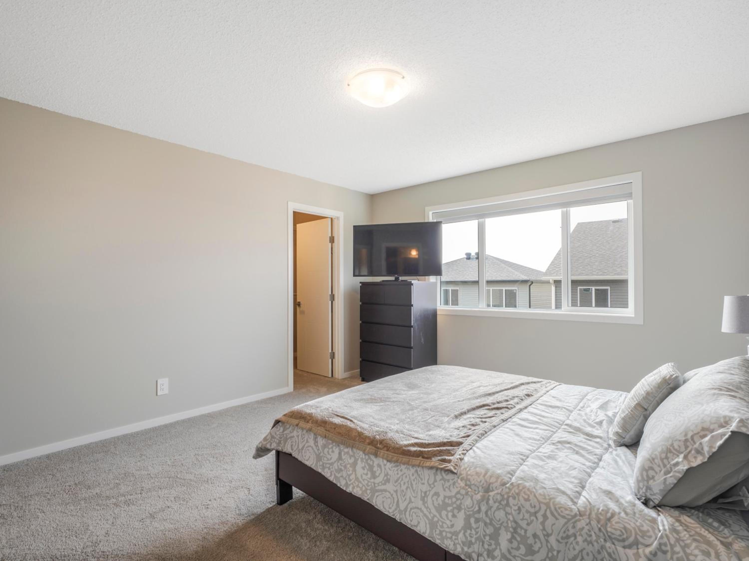 A cozy 3 bedroom new house with 2 living rooms