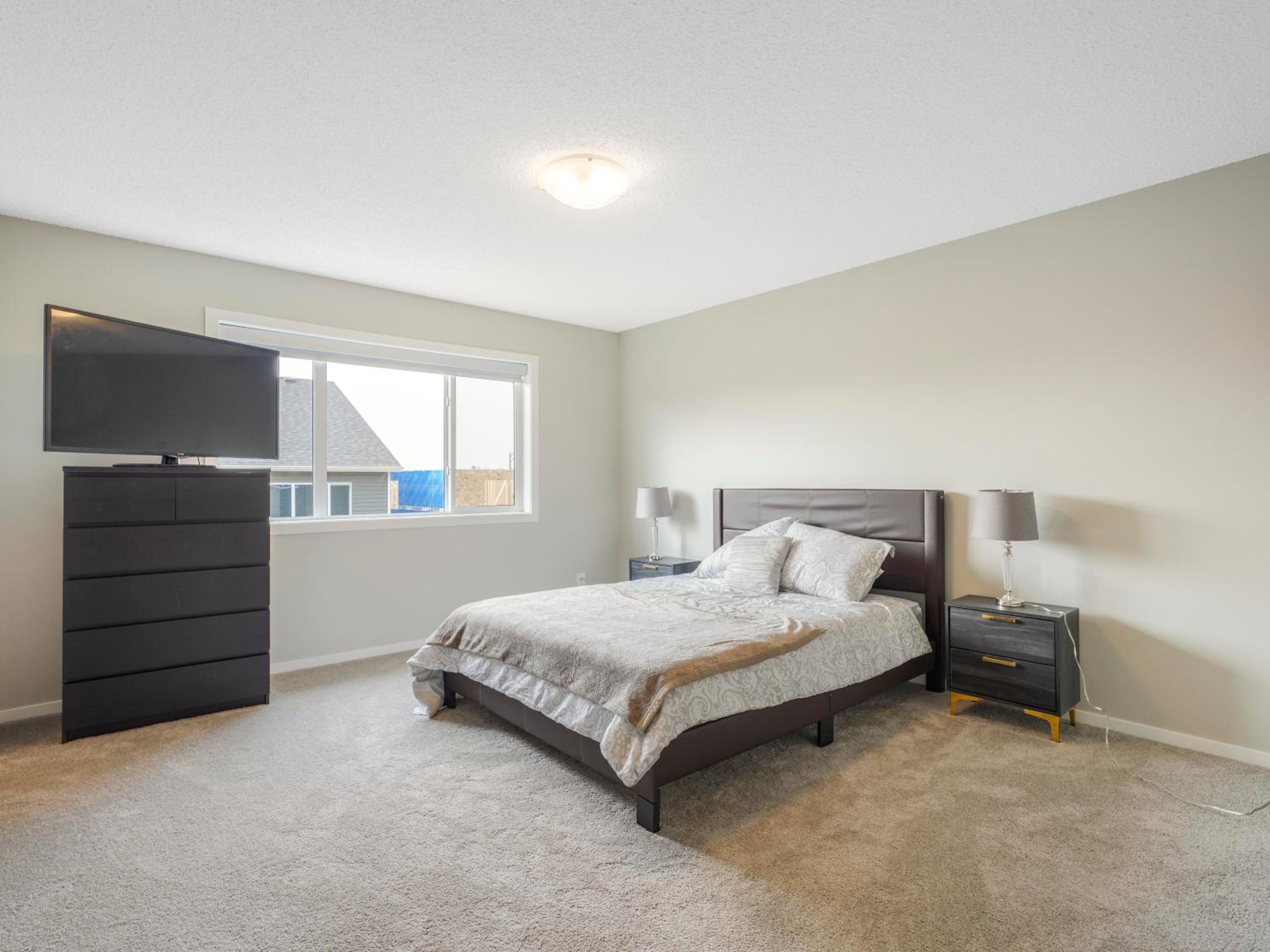 A cozy 3 bedroom new house with 2 living rooms