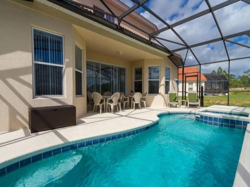 Viola Large 5BR Pool Home in Gated Resort view 2