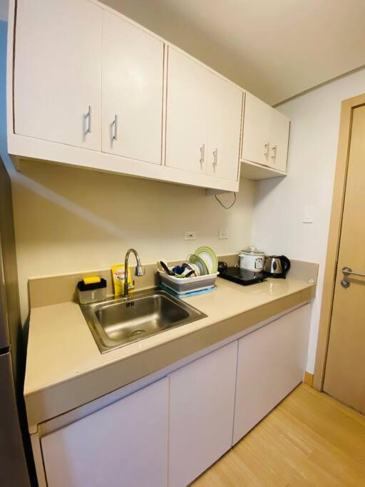 Trees Residences Staycation Evol's Place view 3