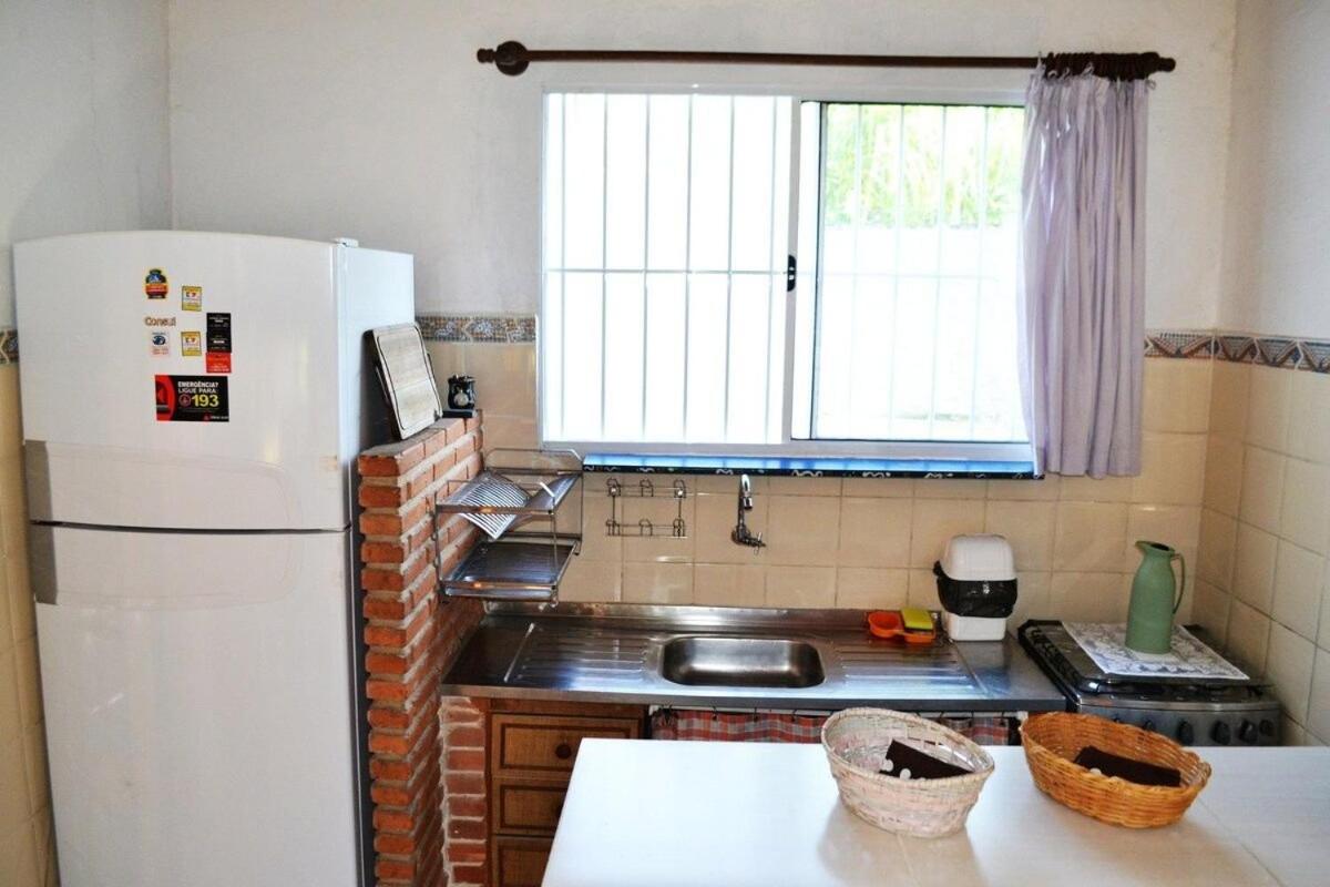 Casa com piscina a 100 m de Camburizinho