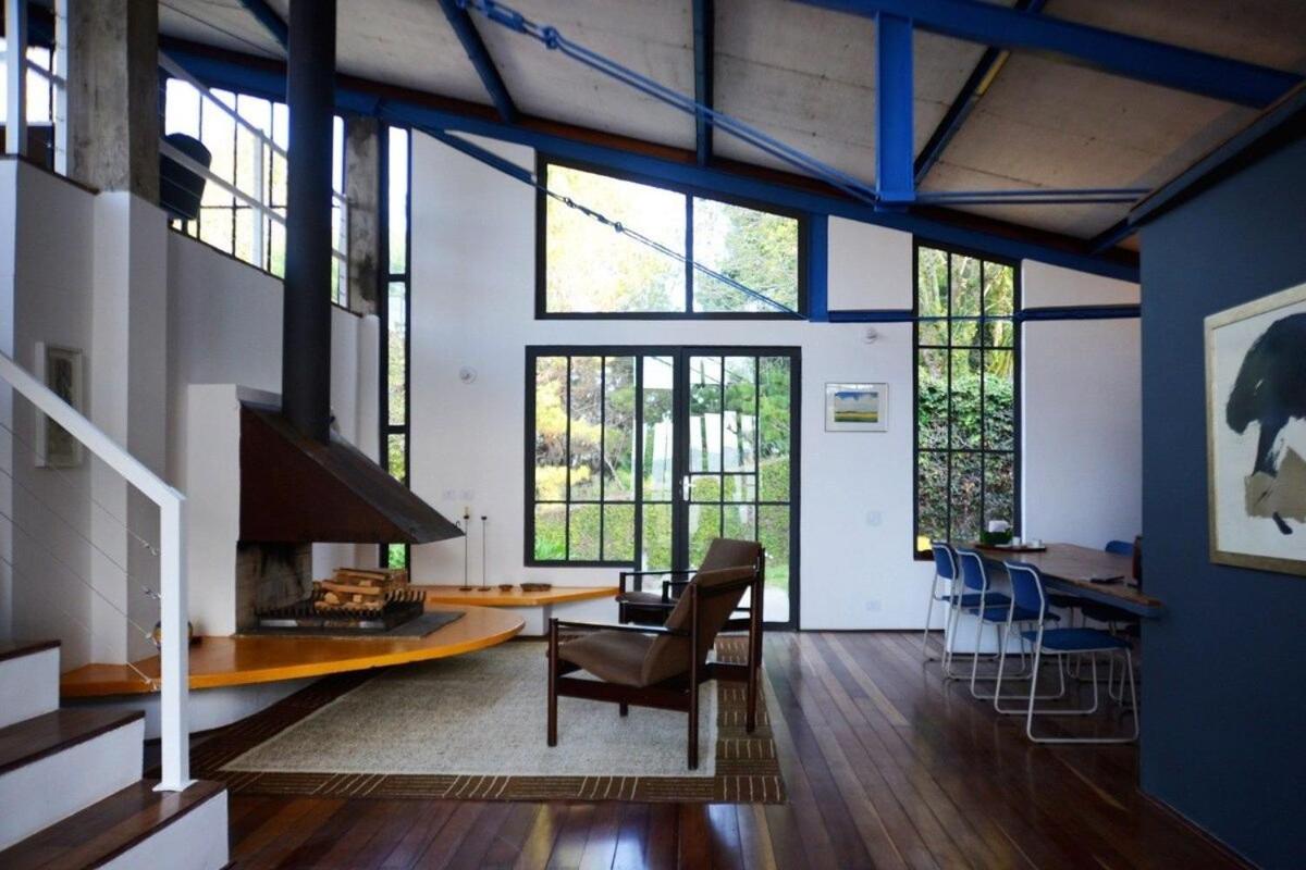 Architect house with view, garden and fireplace