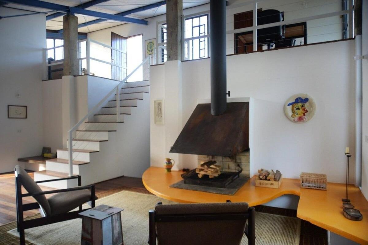 Architect house with view, garden and fireplace