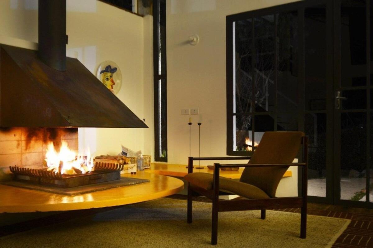 Architect house with view, garden and fireplace