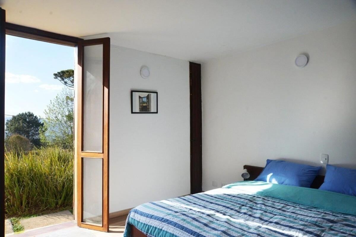 Architect house with view, garden and fireplace