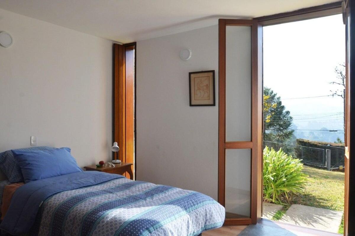 Architect house with view, garden and fireplace