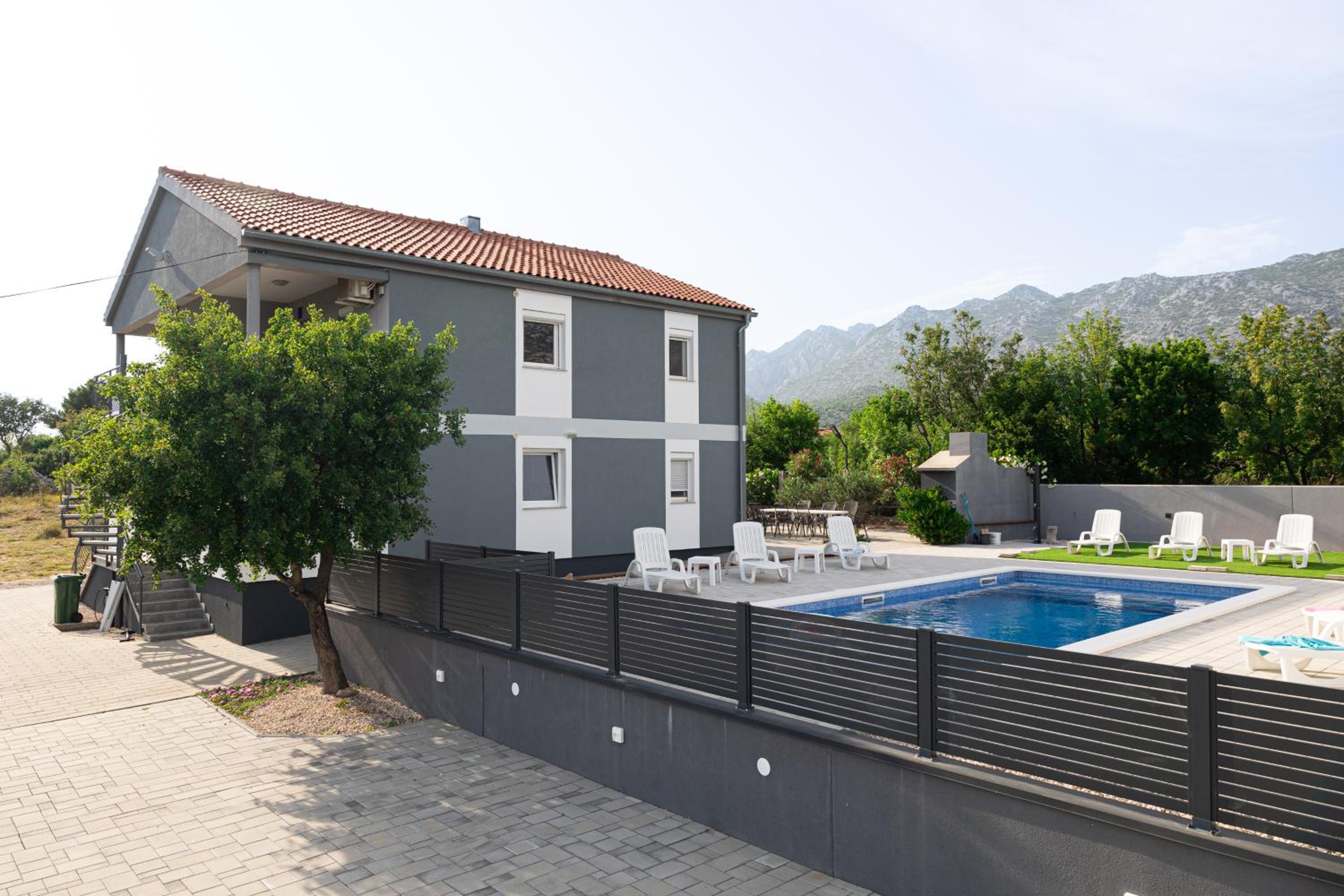 Apartments Zanic with private swimming pool and sea view view 4