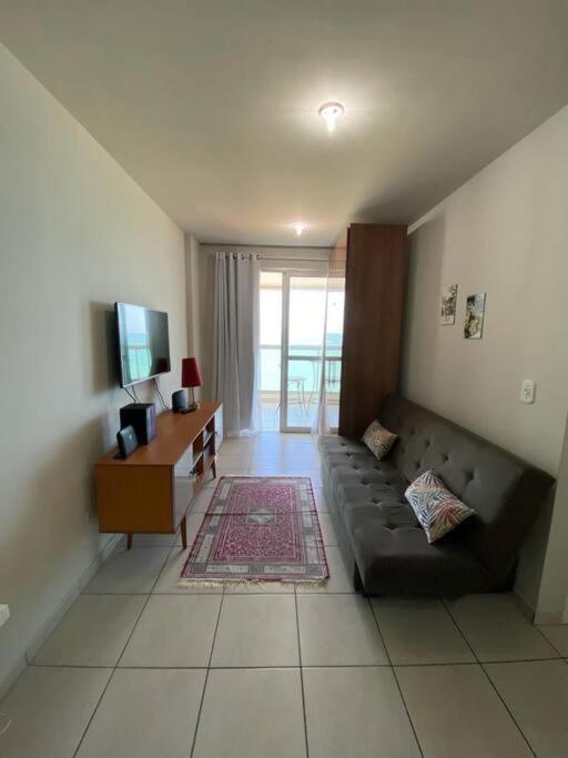Flat frente para o mar