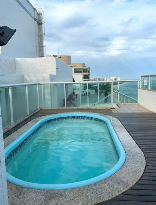 Flat frente para o mar