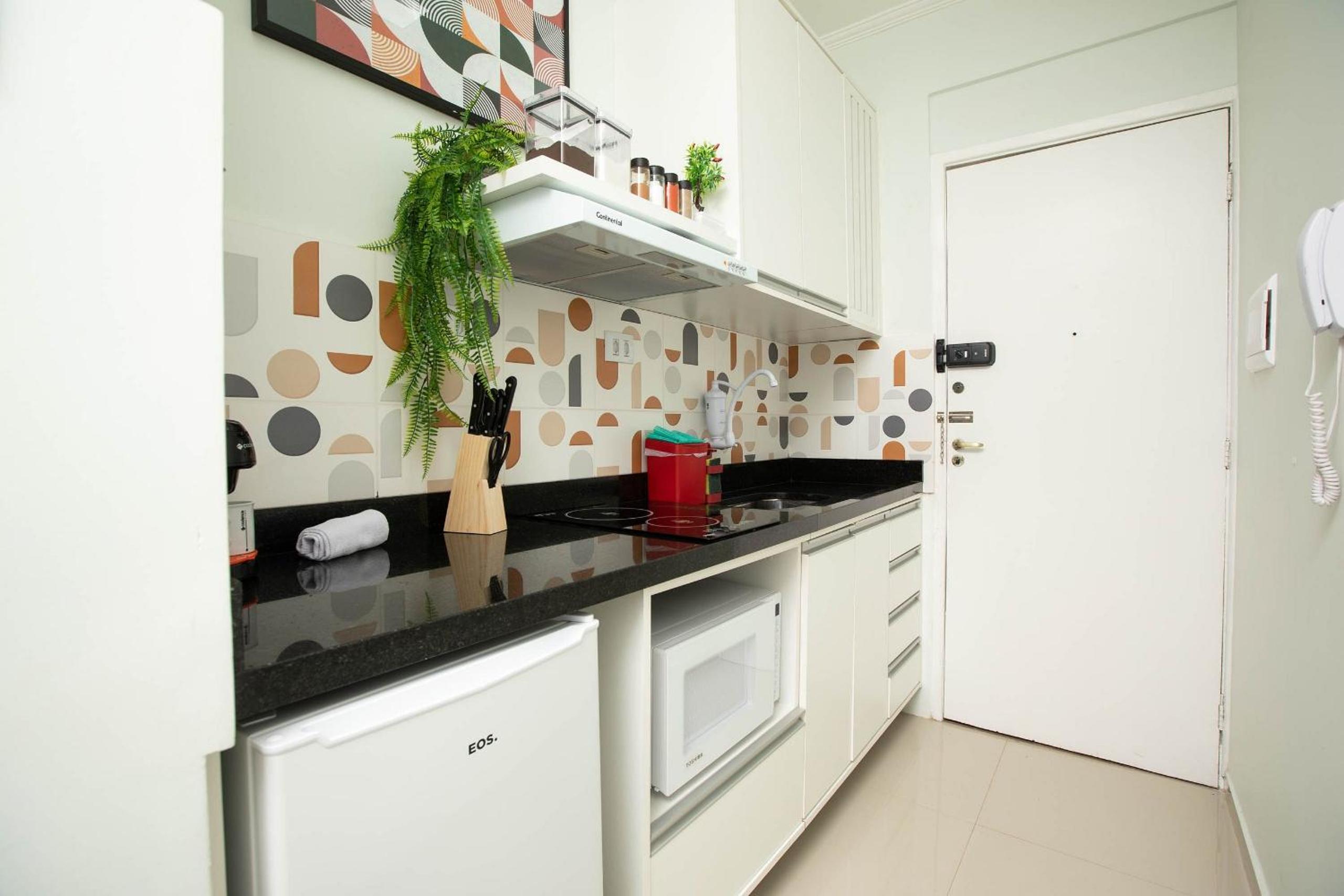 Prédio central com apartamentos reformados