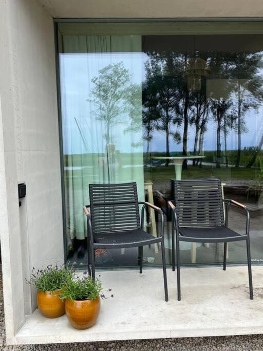 KODA Concrete villa by the river with sea view