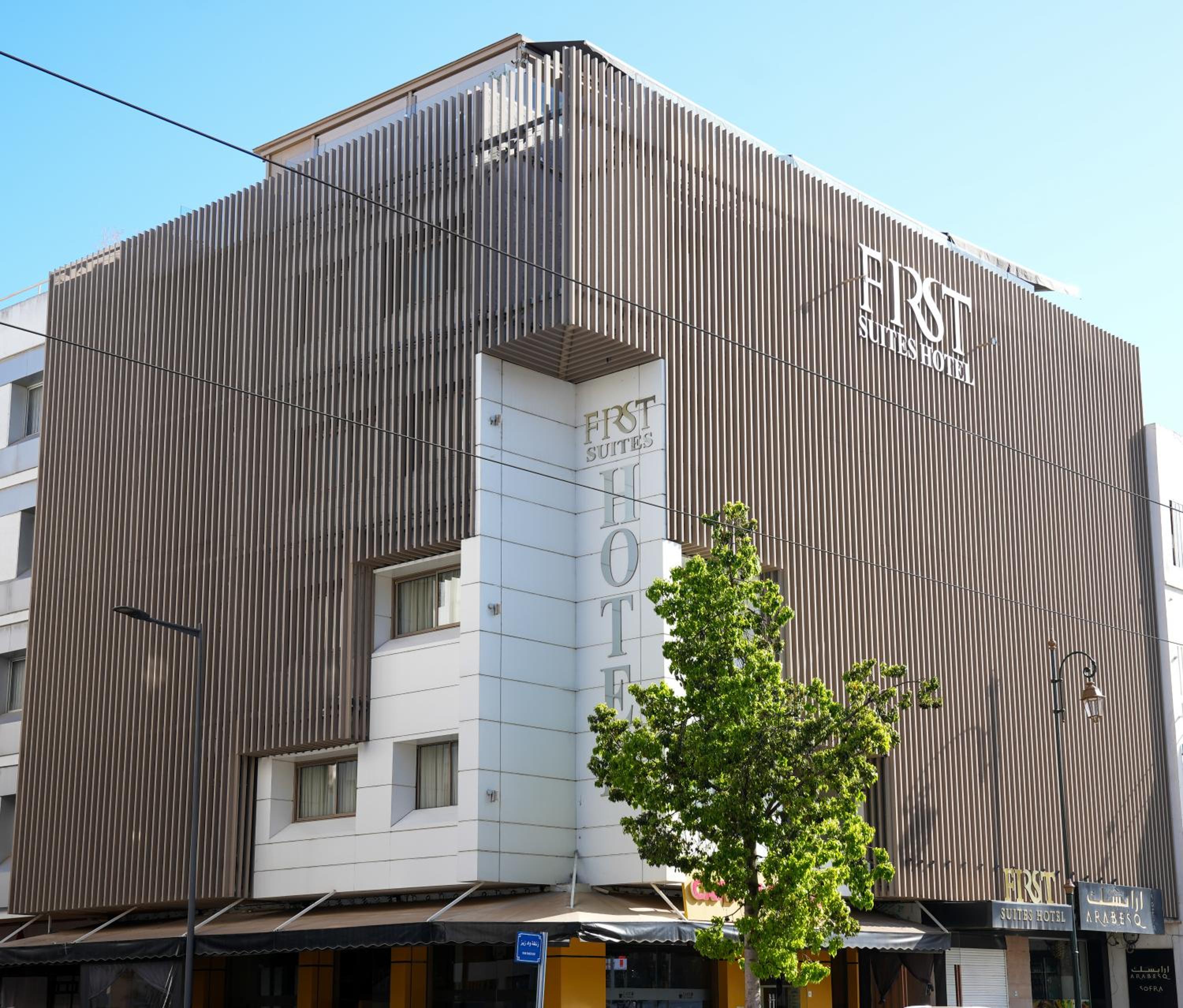 Hotel First Suites Hôtel - Image 1