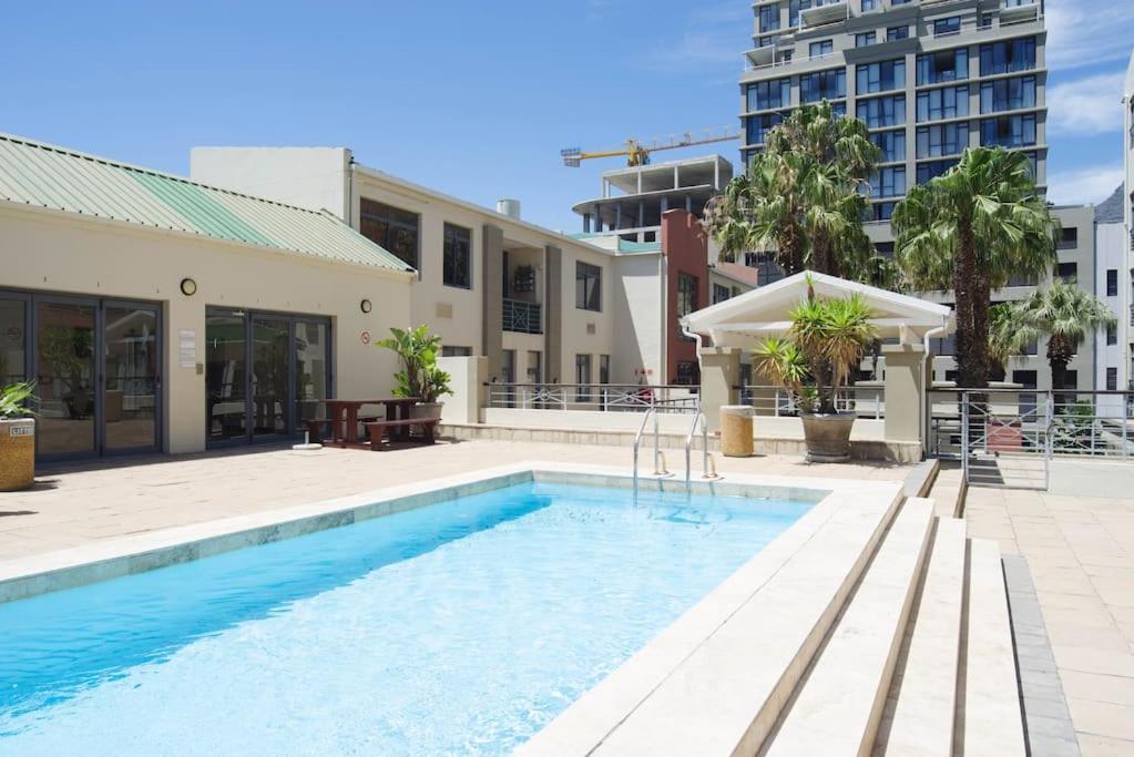Spacious City Living Pool & Gym Facilities view 2