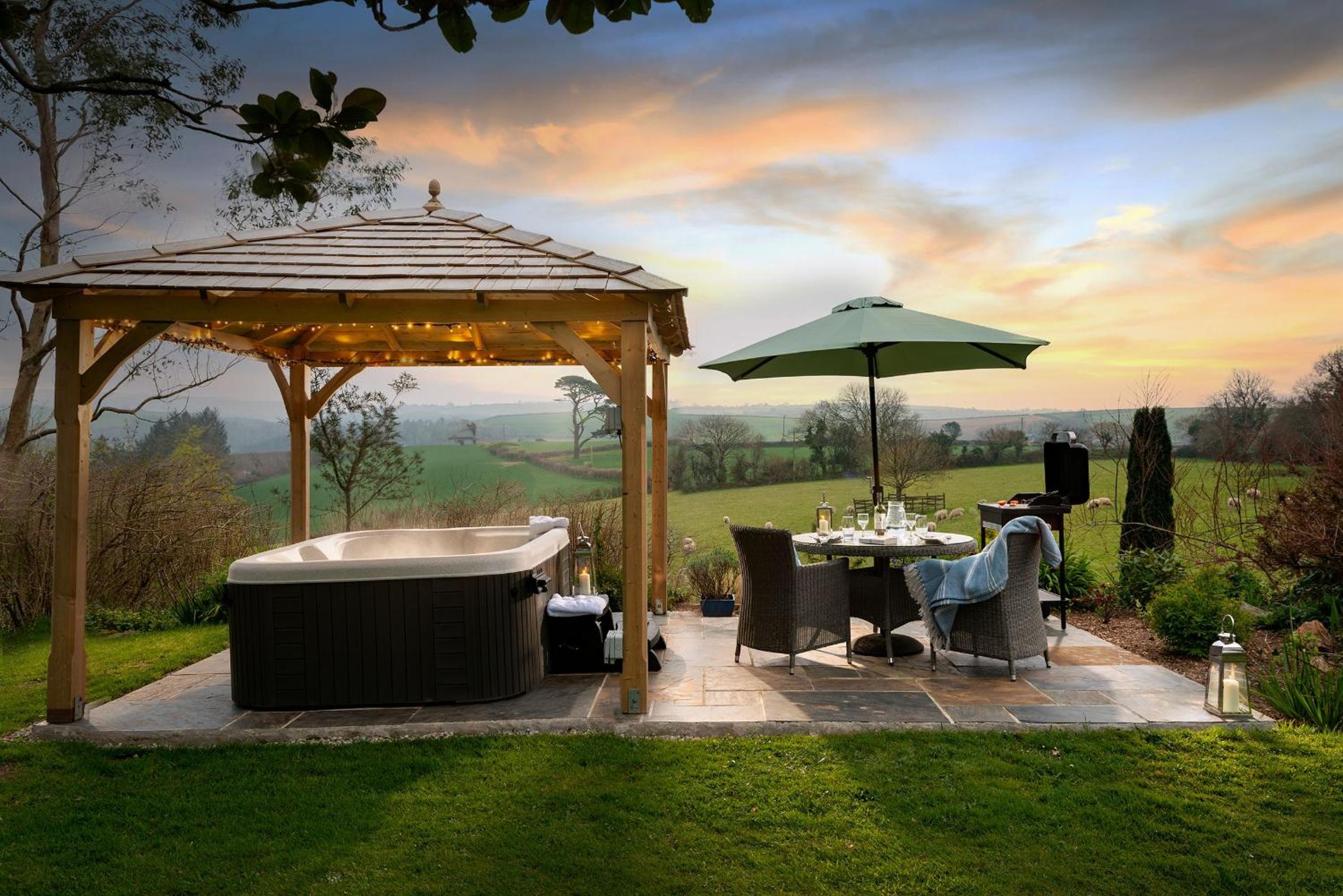 Linhay at East Trenean Farm -Luxury retreat for 2 with stunning rural views, private hot tub and EV charging view 2