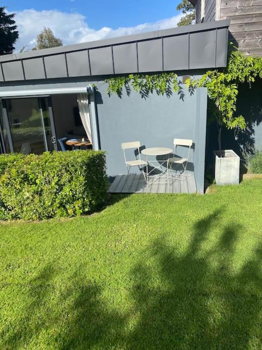 Beautiful garden apartment with private patio and garden view