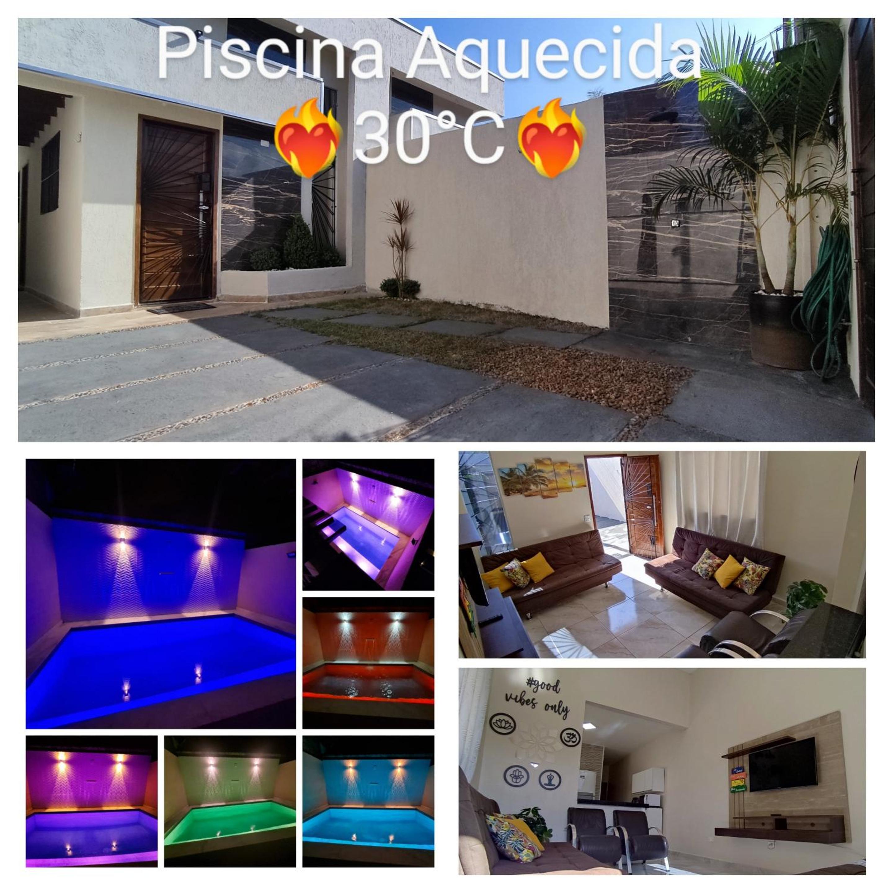 A Casa Linda Com Piscina Aquecida churrasqueira wifi pertinho da praia em Itanhaém