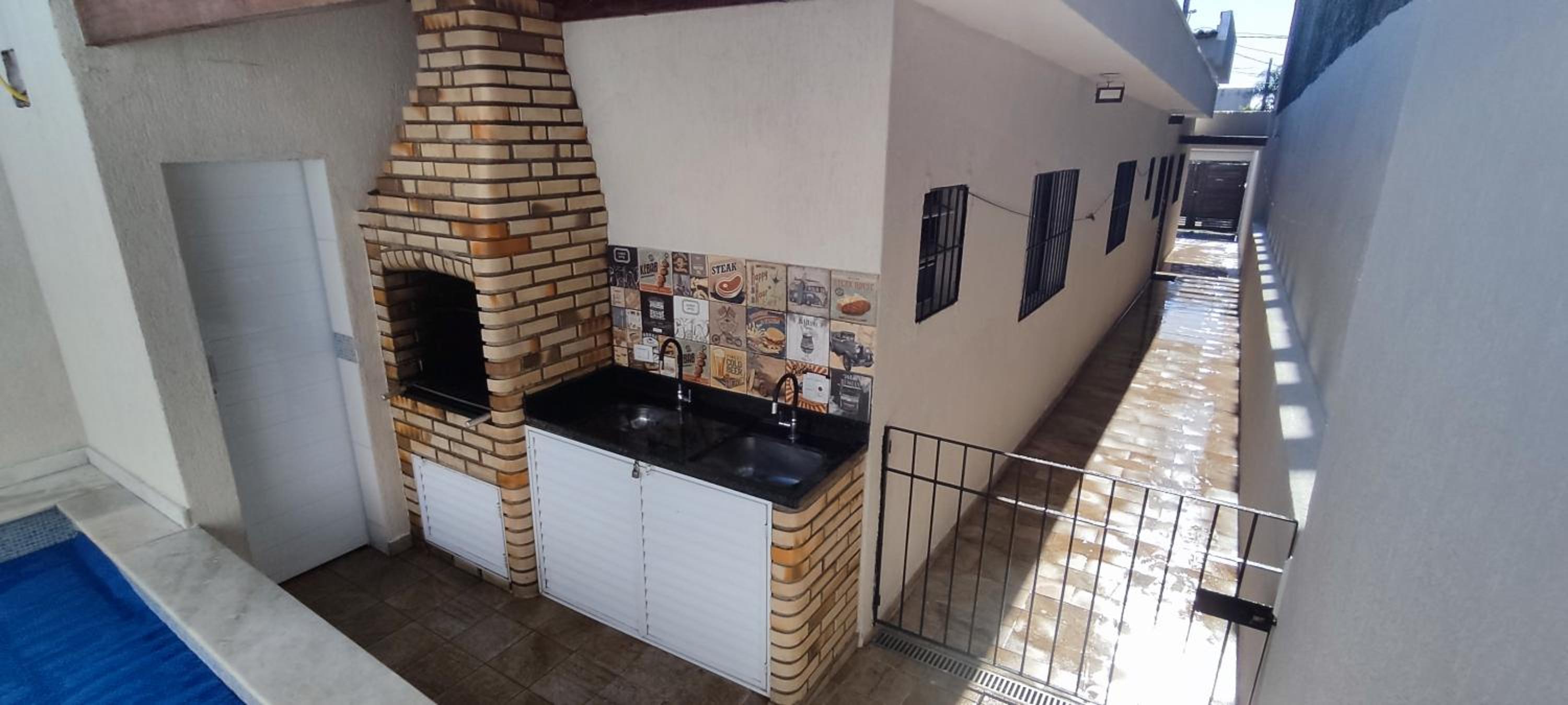 A Casa Linda Com Piscina Aquecida churrasqueira wifi pertinho da praia em Itanhaém