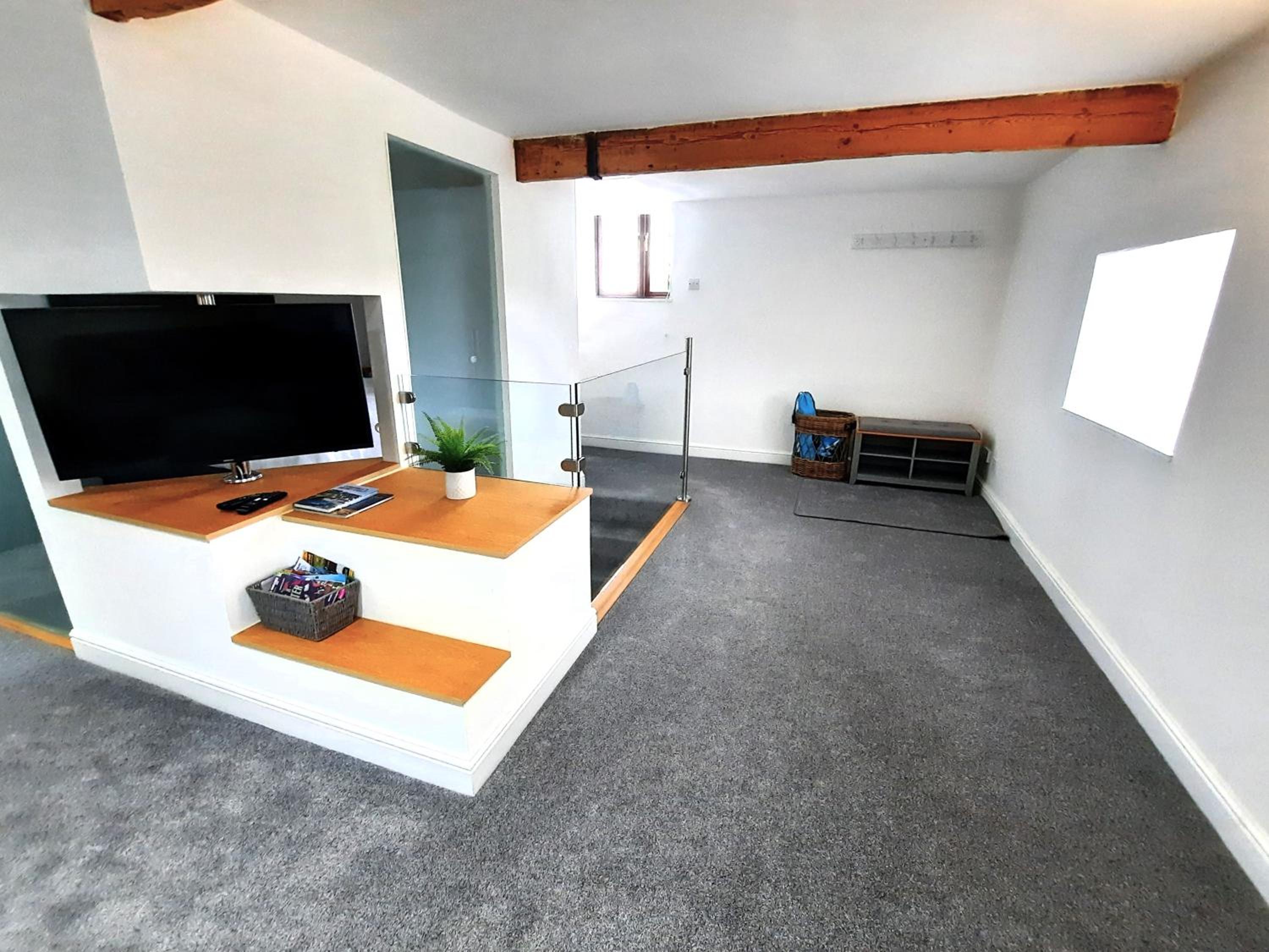 The Penthouse, top floor of a Grade II Listed Mill view 5