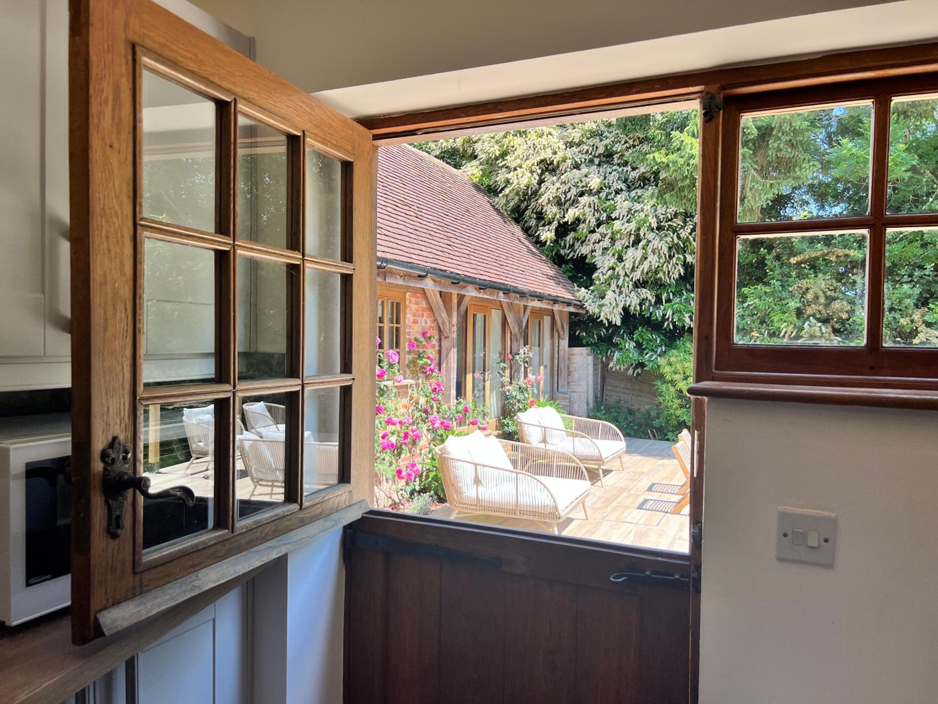 Refurbished coach house with pool & wood fired hot tub view 3