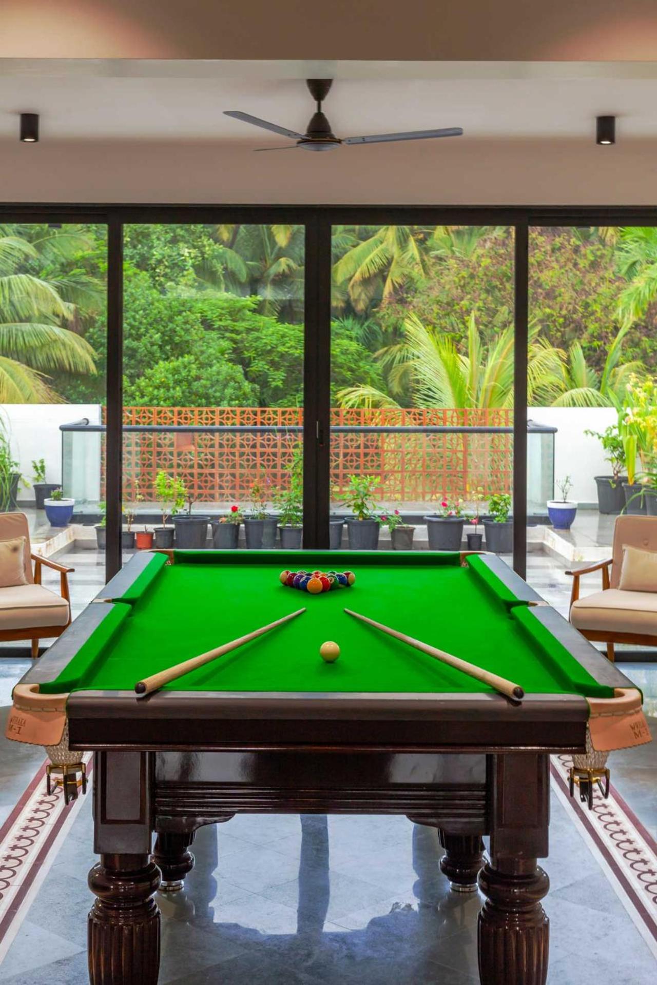 Villa Sereno by StayVista - An elegant and entertaining retreat featuring a swimming pool, modern interiors, and a snooker table