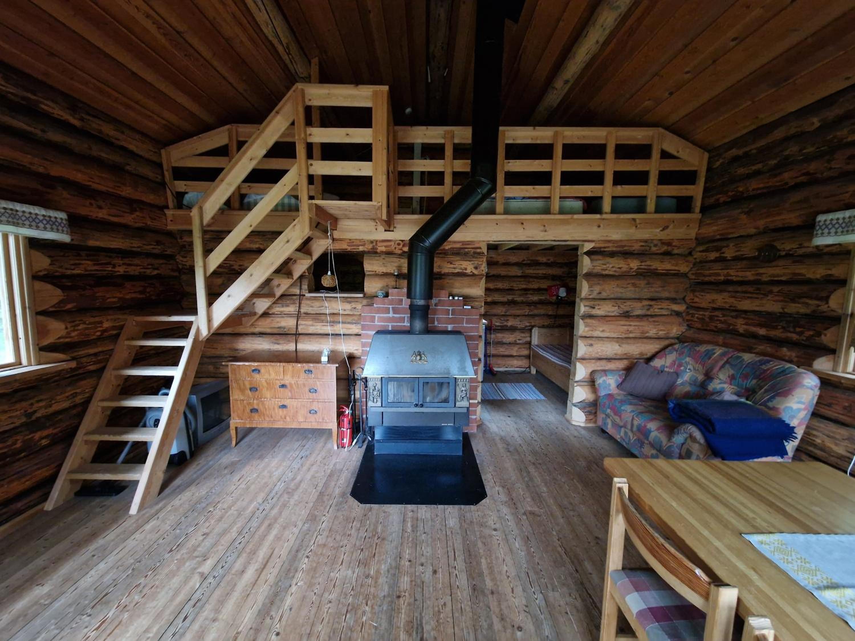 Lakeside wilderness cabin view 5