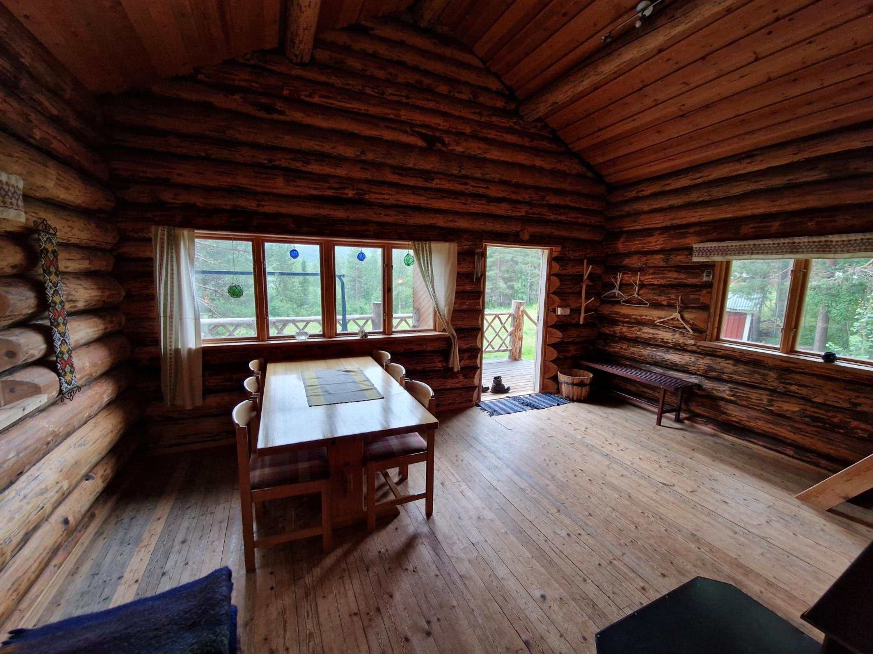 Lakeside wilderness cabin view 4