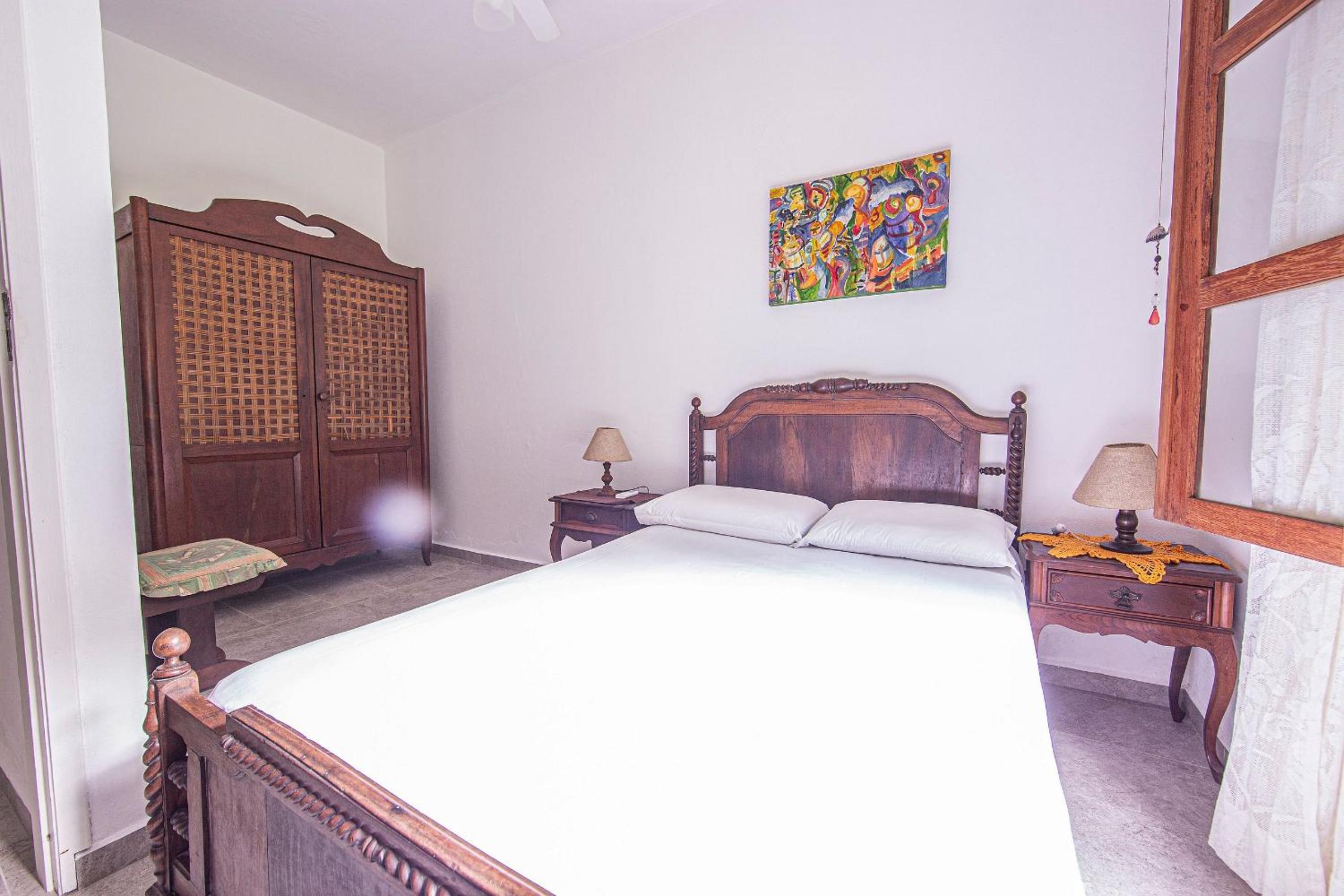 Camburi 5 quartos com piscina natural