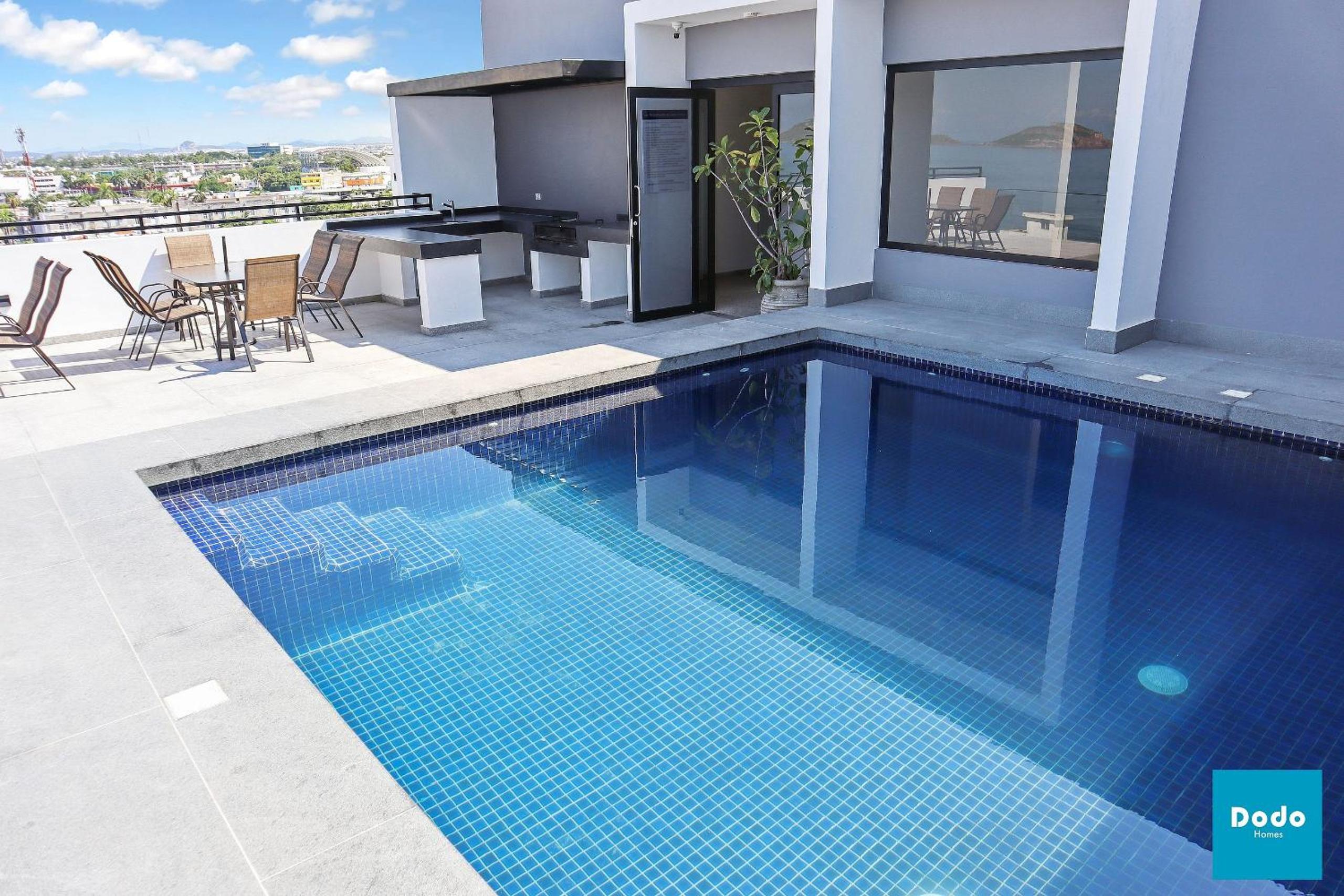 Torre con roof garden y piscina vista al mar view 5