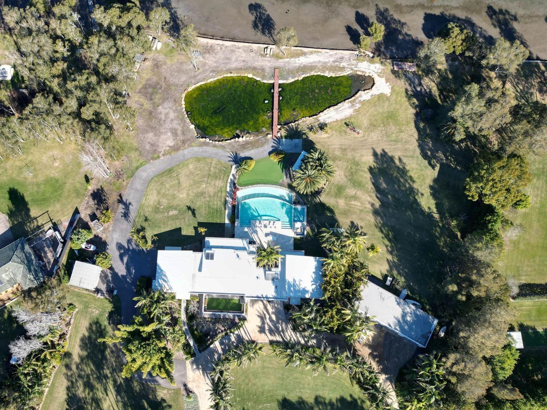 Lake Palm Resort Luxury Retreat absolute Waterfront on 3 acres at Lake Macquarie.