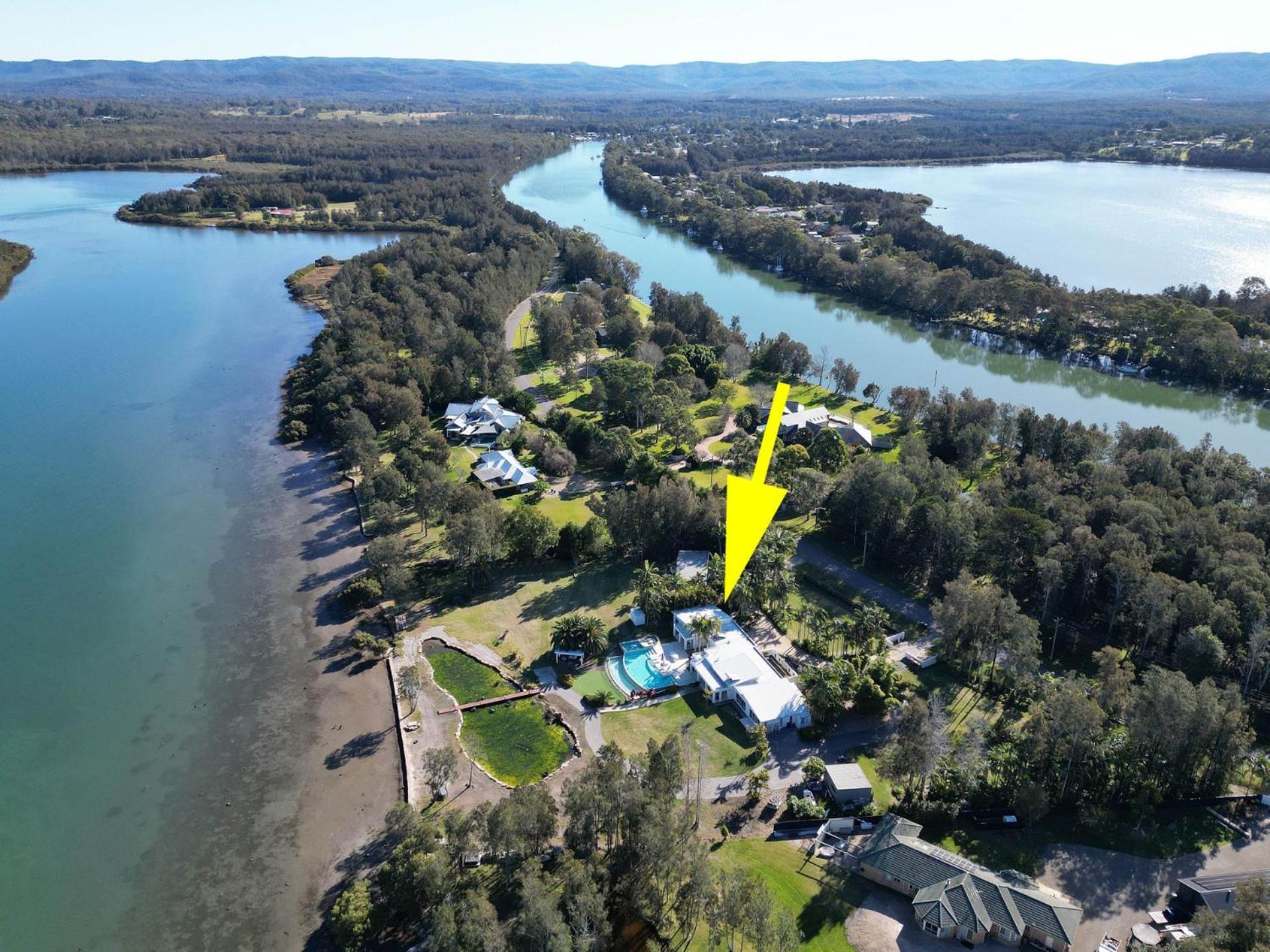 Lake Palm Resort Luxury Retreat absolute Waterfront on 3 acres at Lake Macquarie.