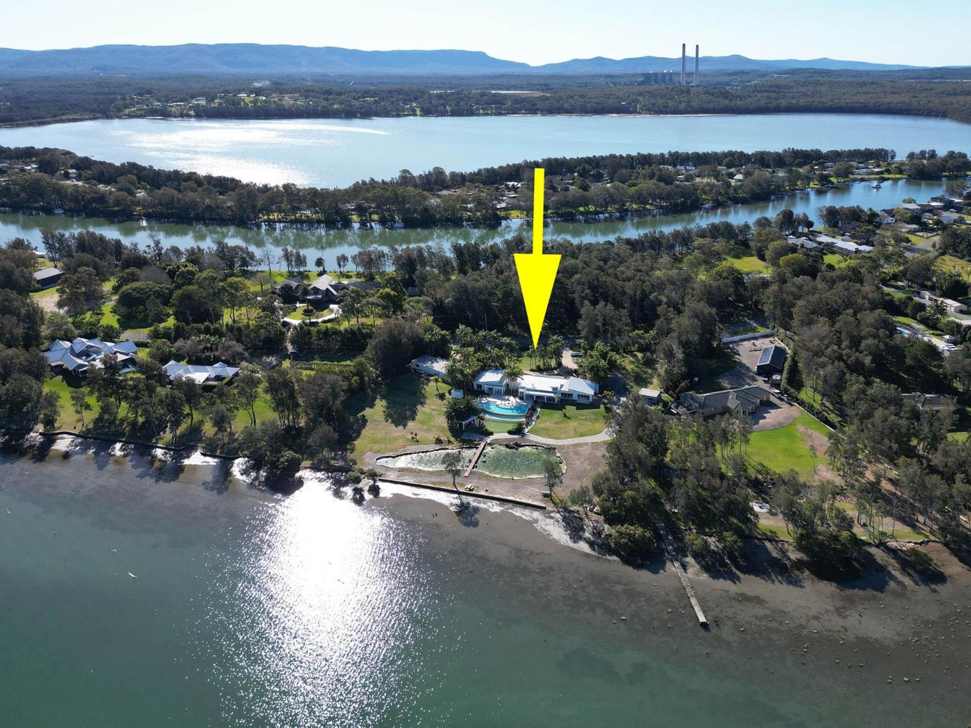 Lake Palm Resort Luxury Retreat absolute Waterfront on 3 acres at Lake Macquarie.