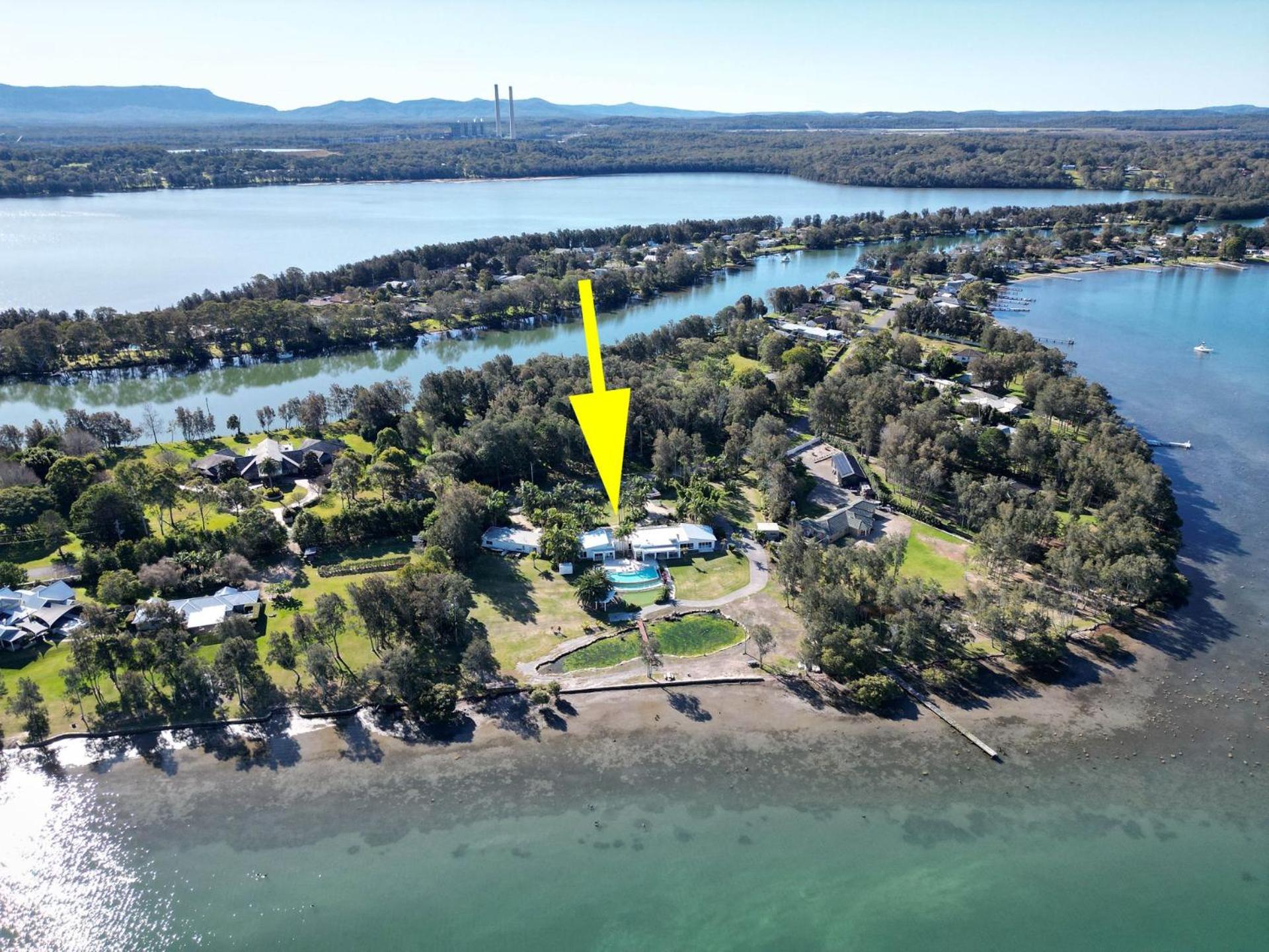 Lake Palm Resort Luxury Retreat absolute Waterfront on 3 acres at Lake Macquarie.