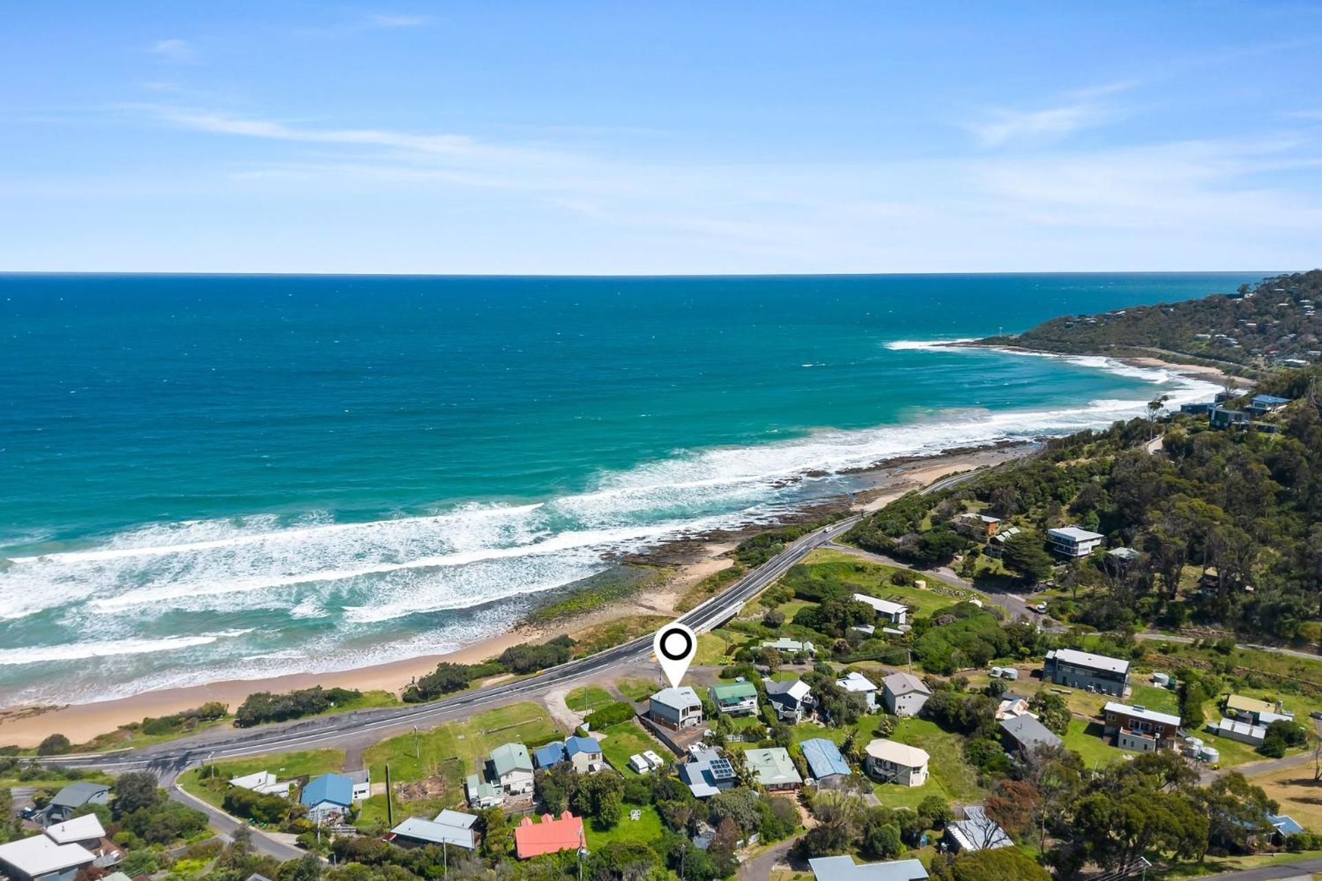 Six Degrees - beach across the road
