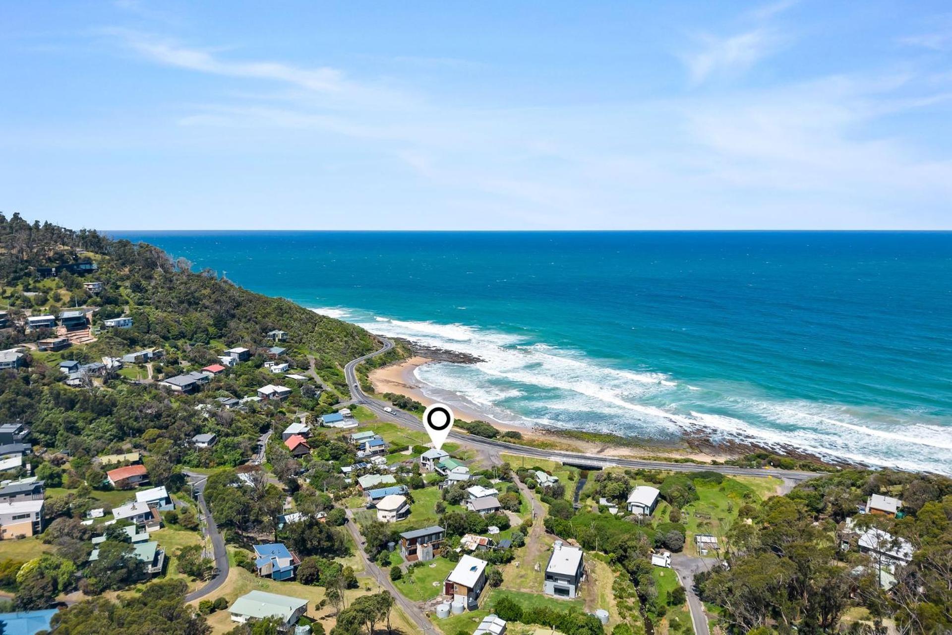 Six Degrees - beach across the road