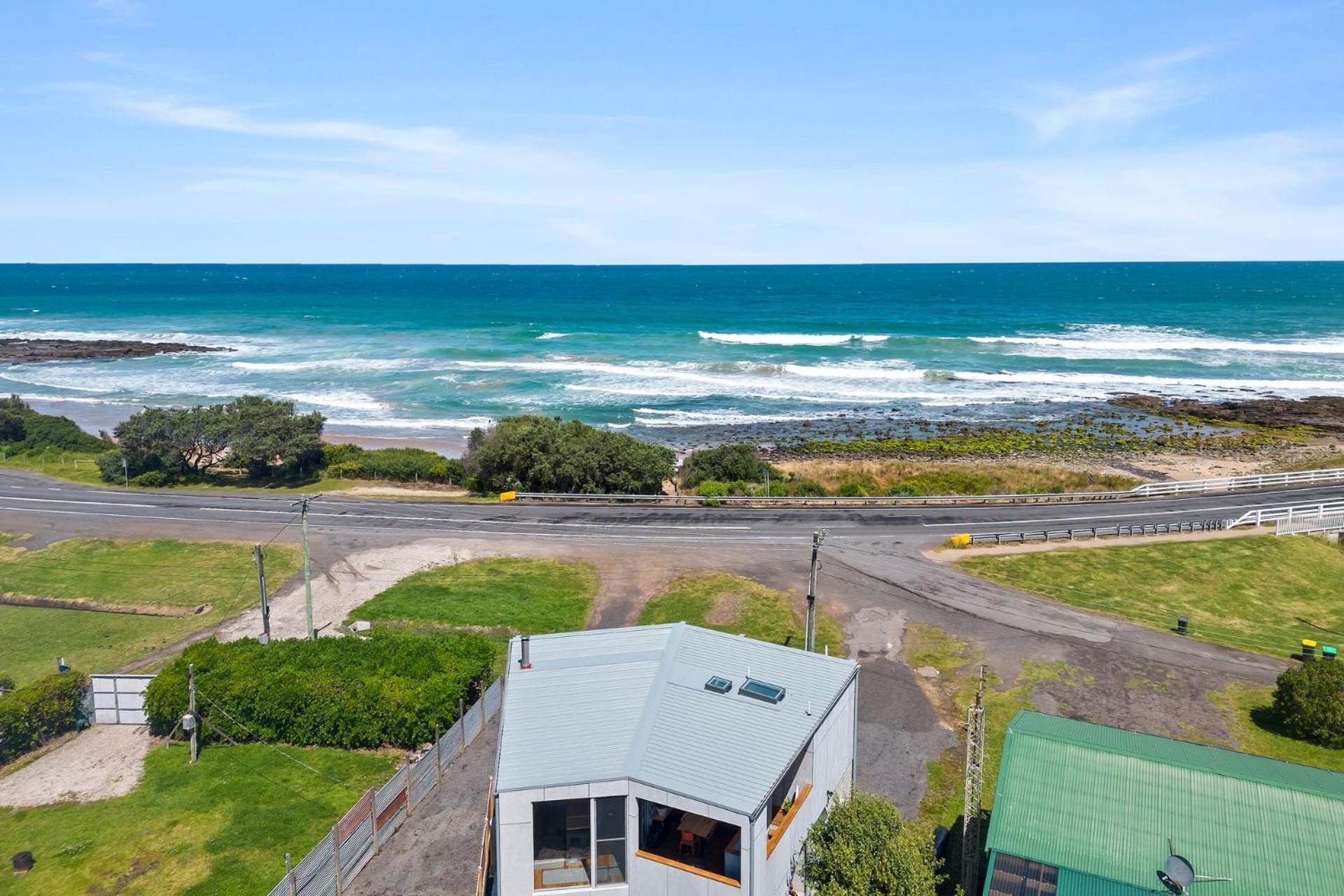 Six Degrees - beach across the road