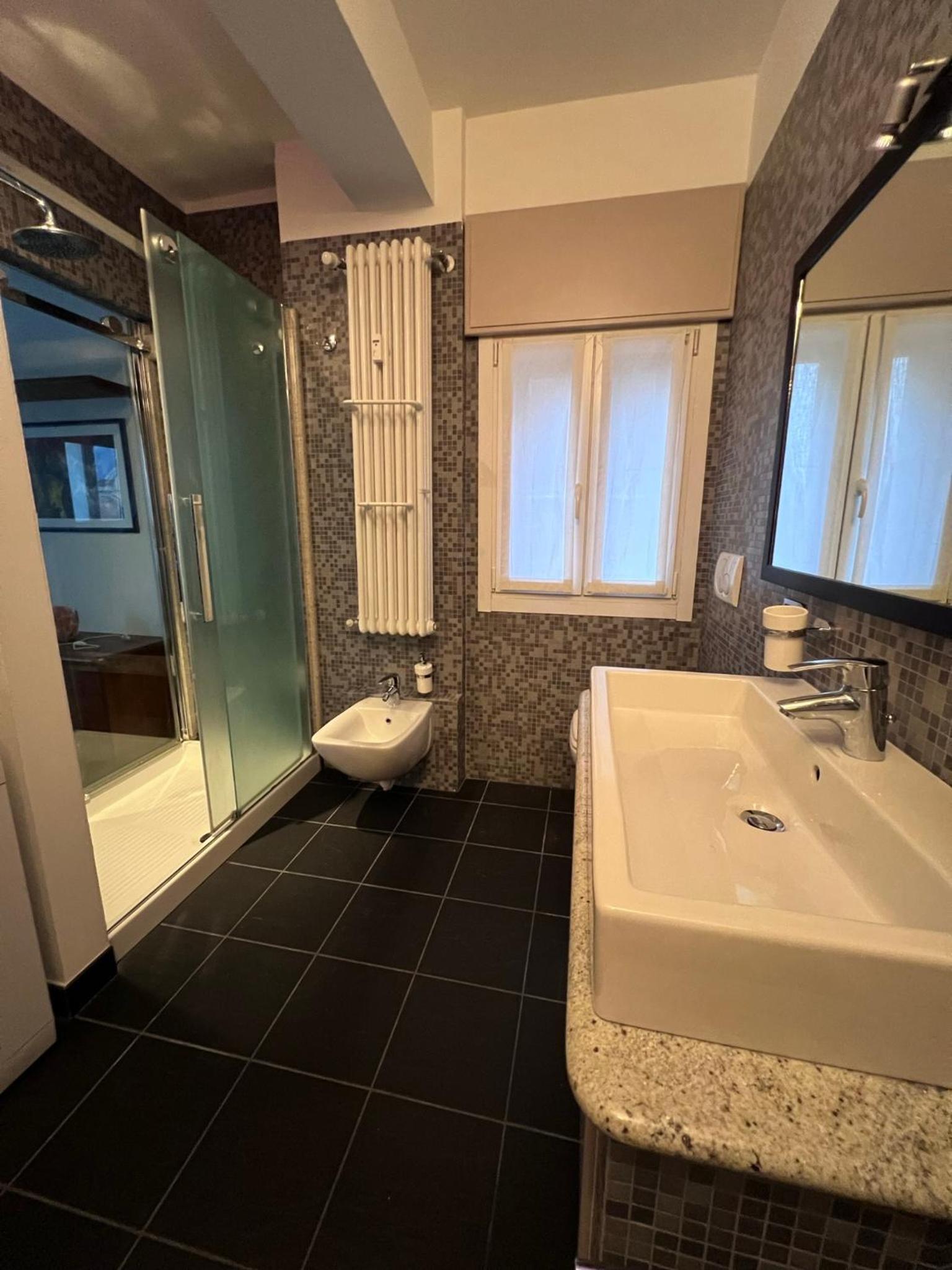 Casa vacanze Attico sul lago di Lecco, a due passi dal centro con posto auto