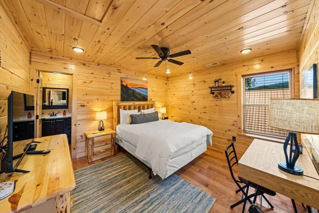 LUXURY 4BR Cabin in Gatlinburg with Views Hot Tub with Private Deck Game Room Most Popular Coffee Bar Perfect for Family Getaway Tennis Courts Infant Crib  view 4
