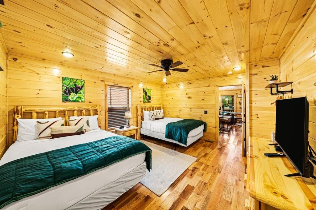 LUXURY 4BR Cabin in Gatlinburg with Views Hot Tub with Private Deck Game Room Most Popular Coffee Bar Perfect for Family Getaway Tennis Courts Infant Crib  view 5