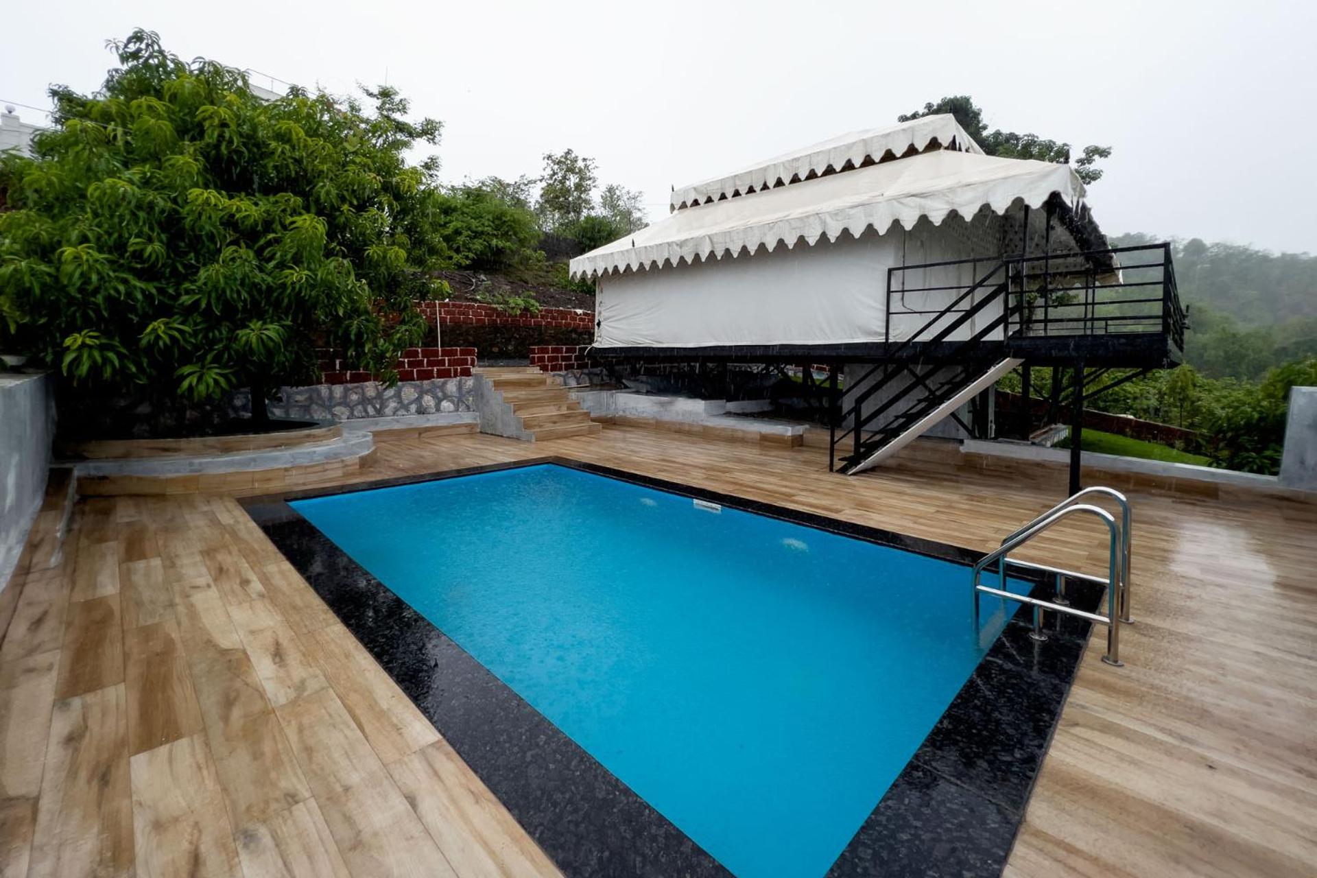 StayVista's Panoramic Peaks - Mountain-View Villa with Pool, Tent & Turf view 2