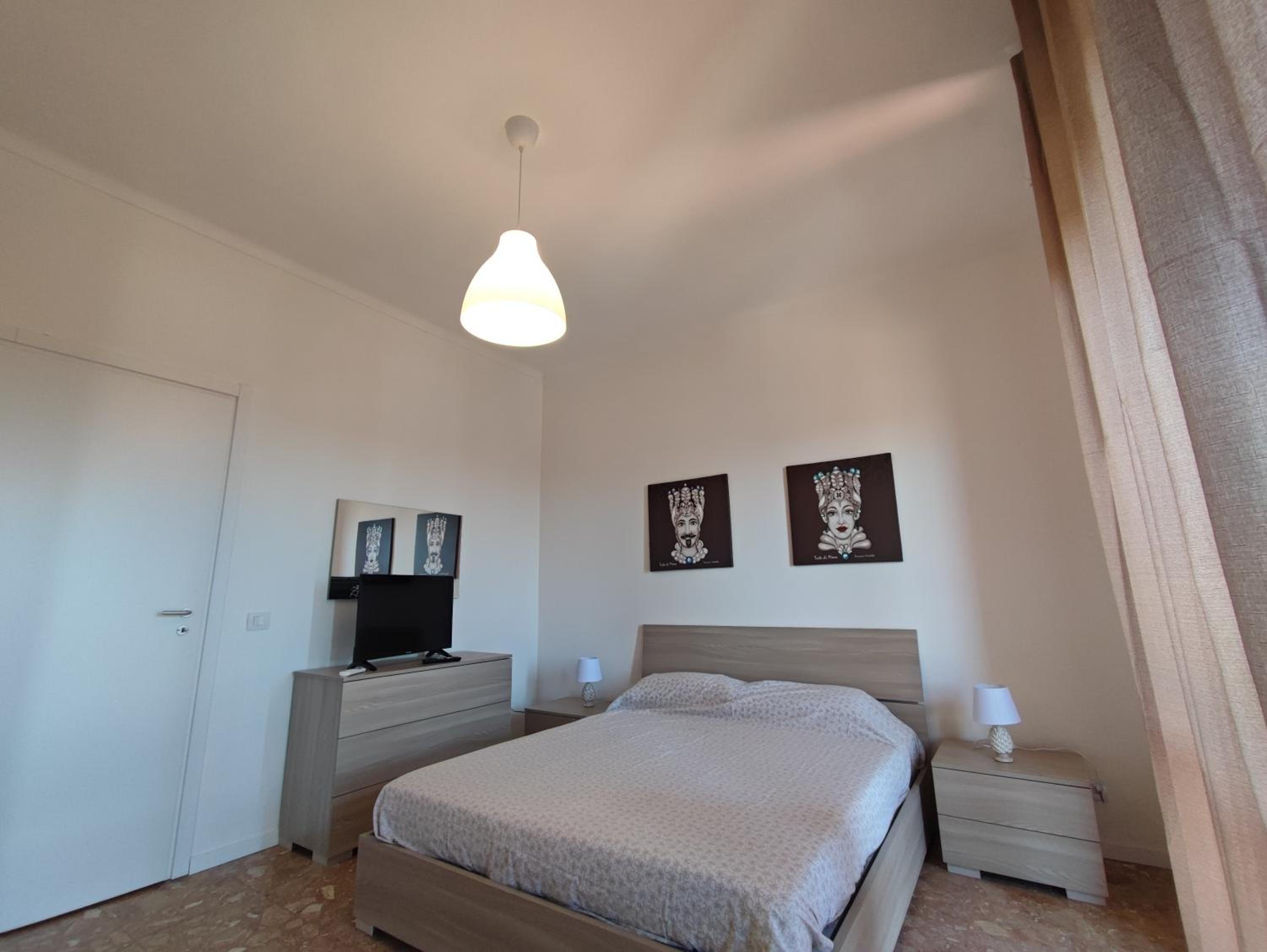 La casa sui tetti en Catania — hotel room