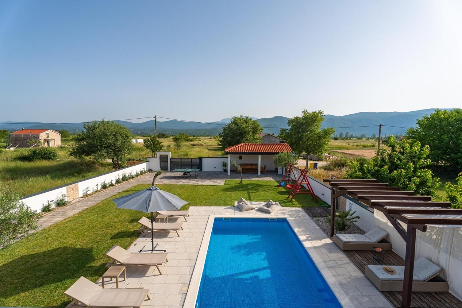 Villa Anja is a 4 bedroom villa with a 32 sqm heated pool near Imotski