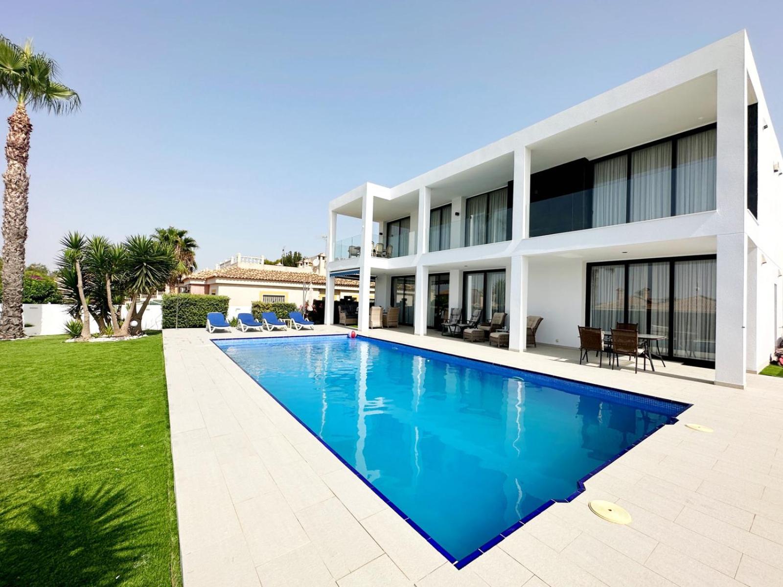 Luxury villa with large swimming pool and outdoor area
