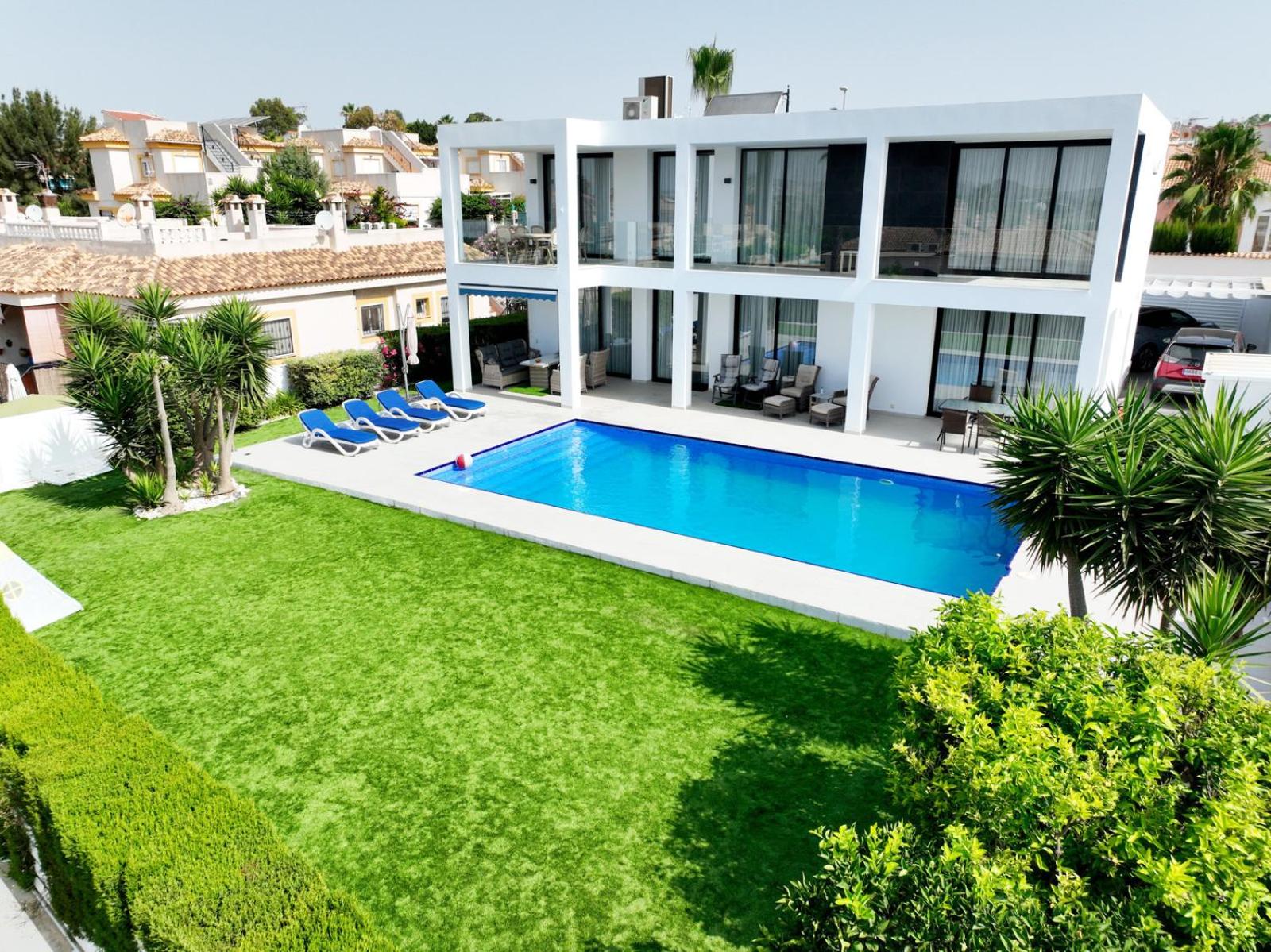 Luxury villa with large swimming pool and outdoor area