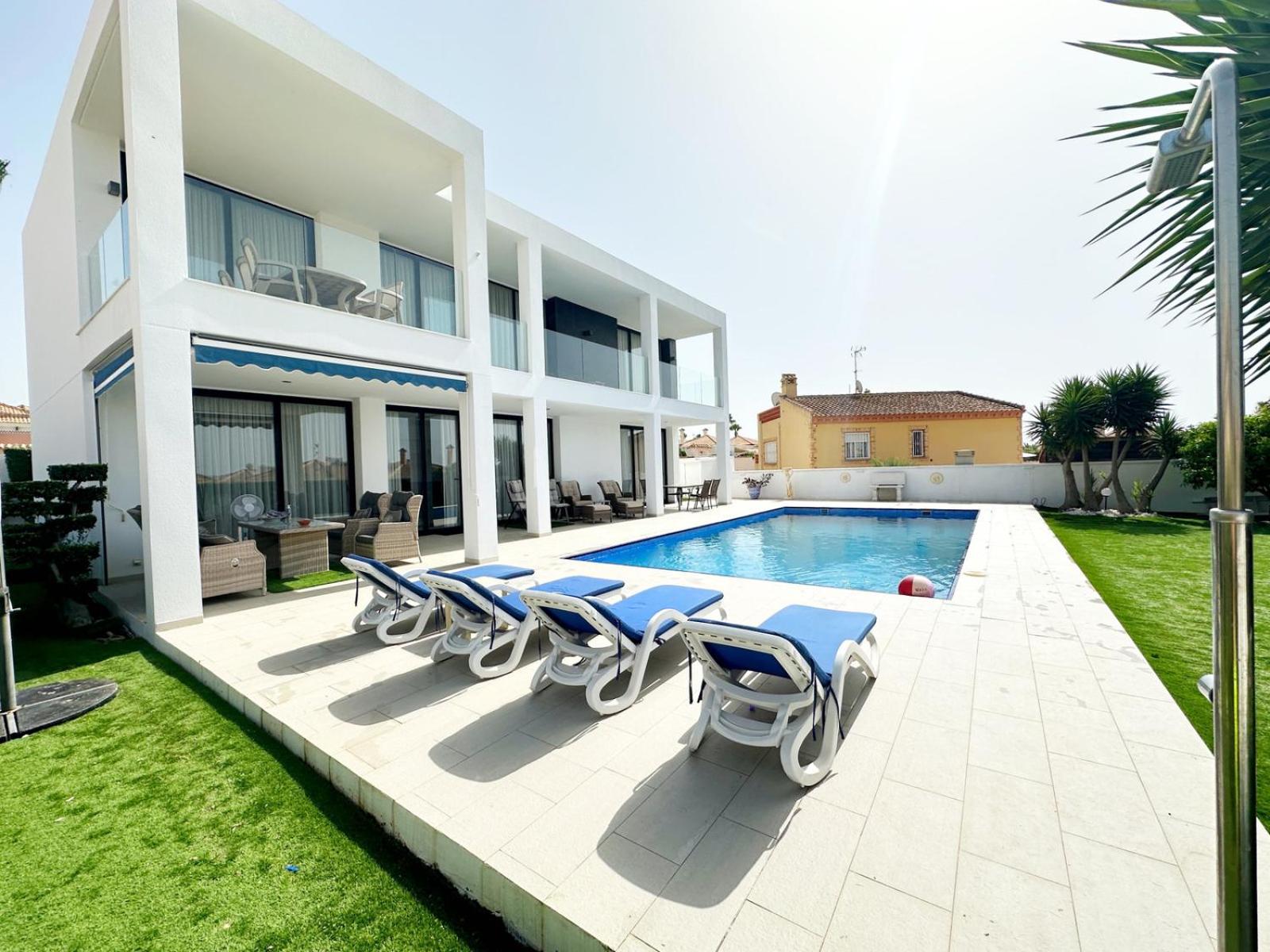 Luxury villa with large swimming pool and outdoor area